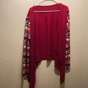 Red sweater with multicolor sleeves